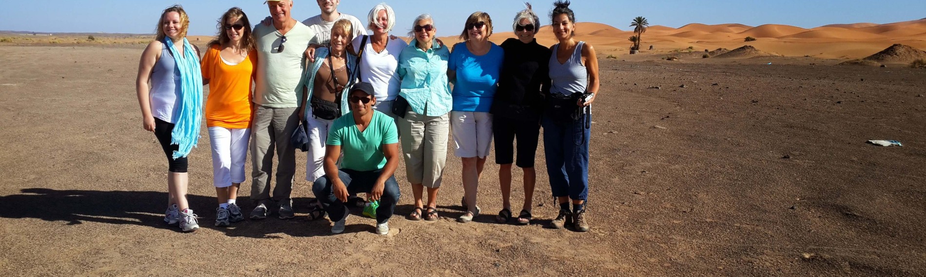 American group of women exploring the desert of Merzouga in Morocco